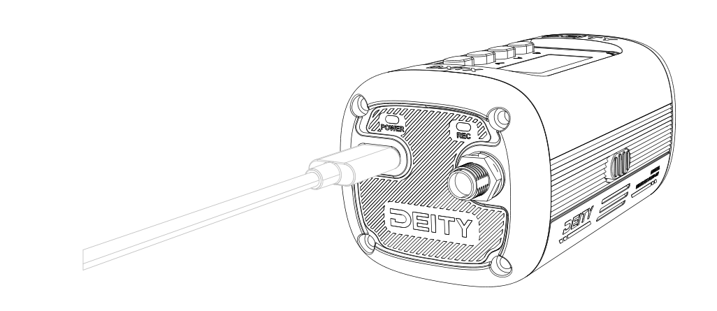 USB-C cable connected to the bottom of the DXTX next to the POWER and REC LEDs