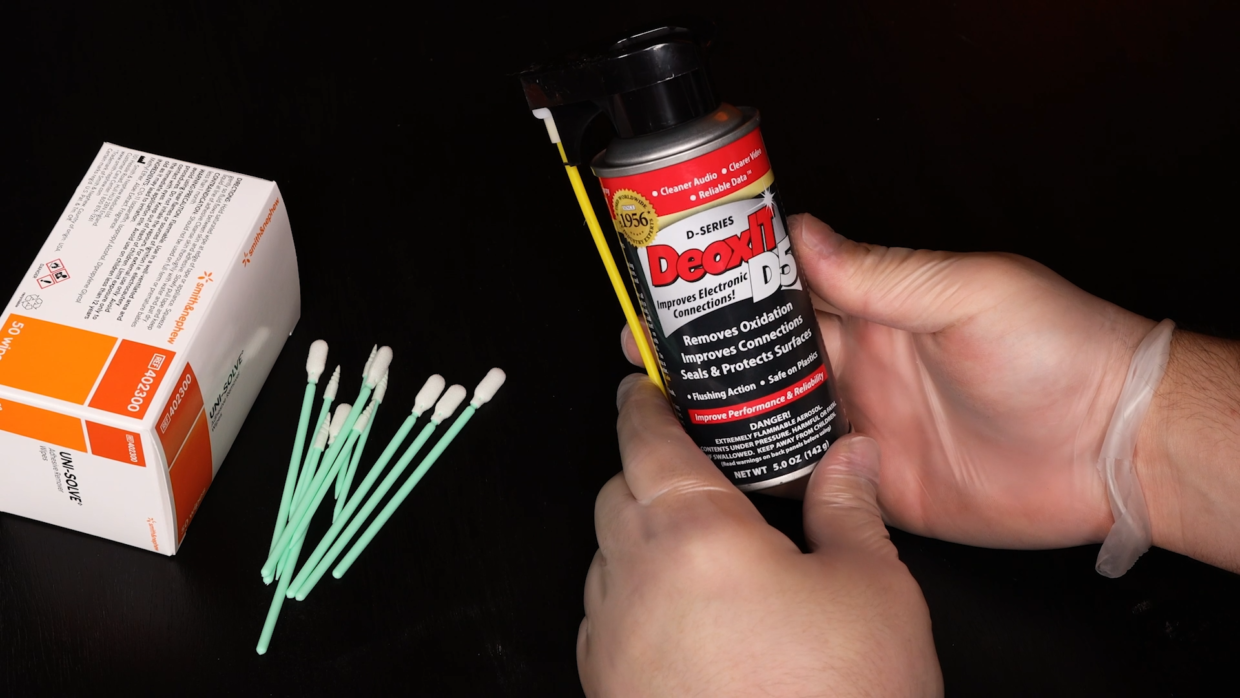 Uni-solve wipes and can of DeoxIT